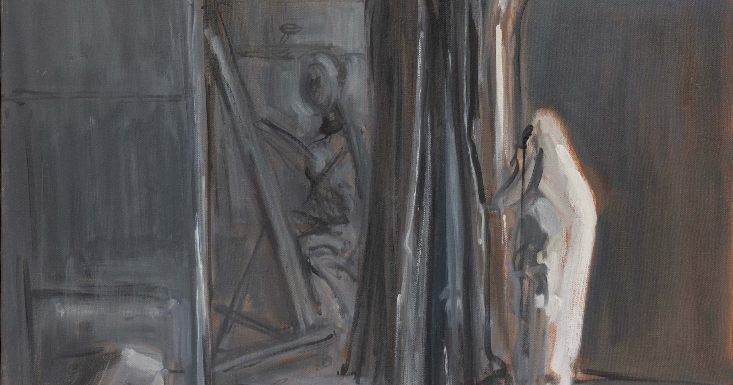 Painted figure beside a canvas in a dark studio