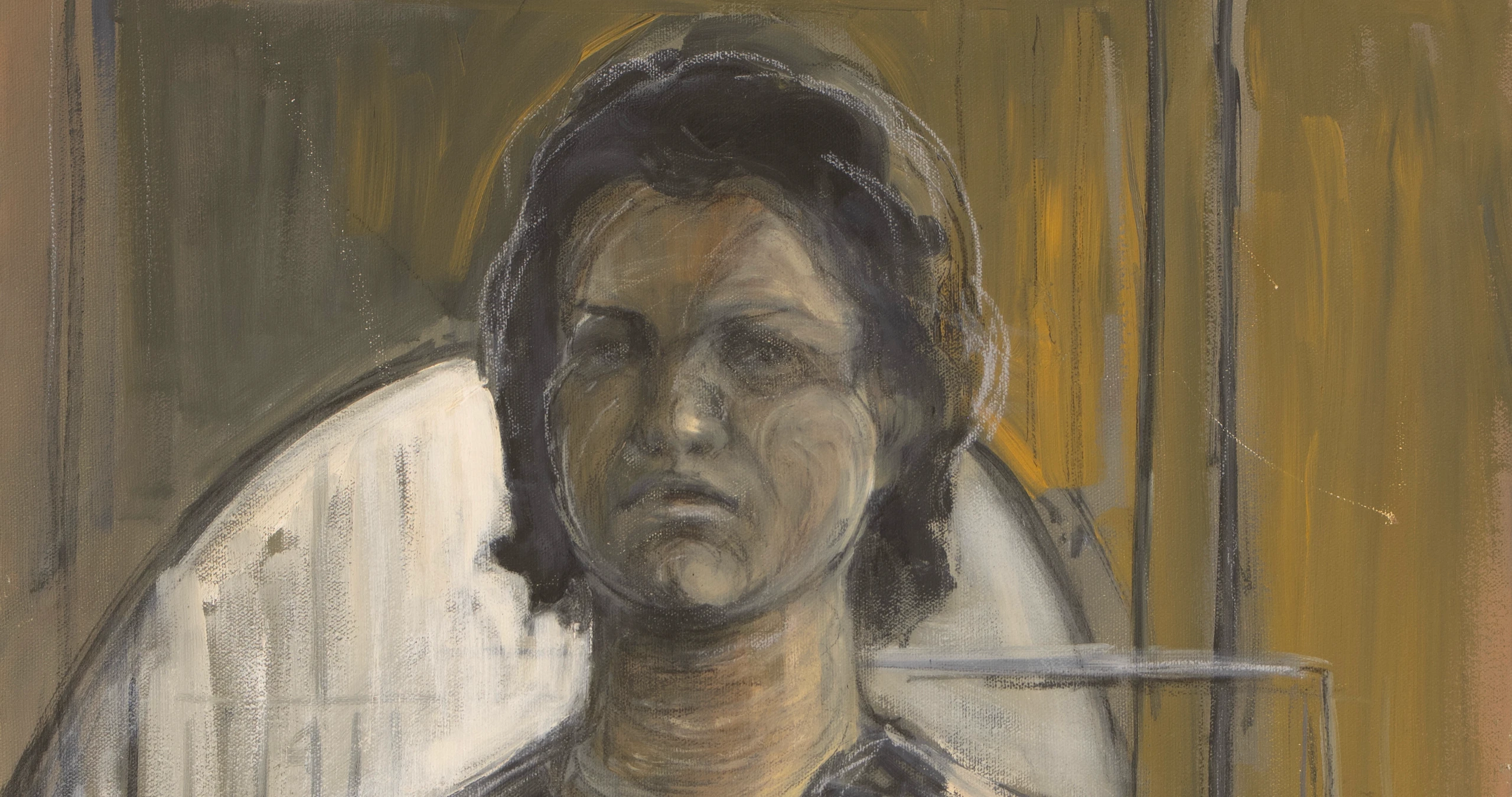 Portrait of a woman seated in a white chair