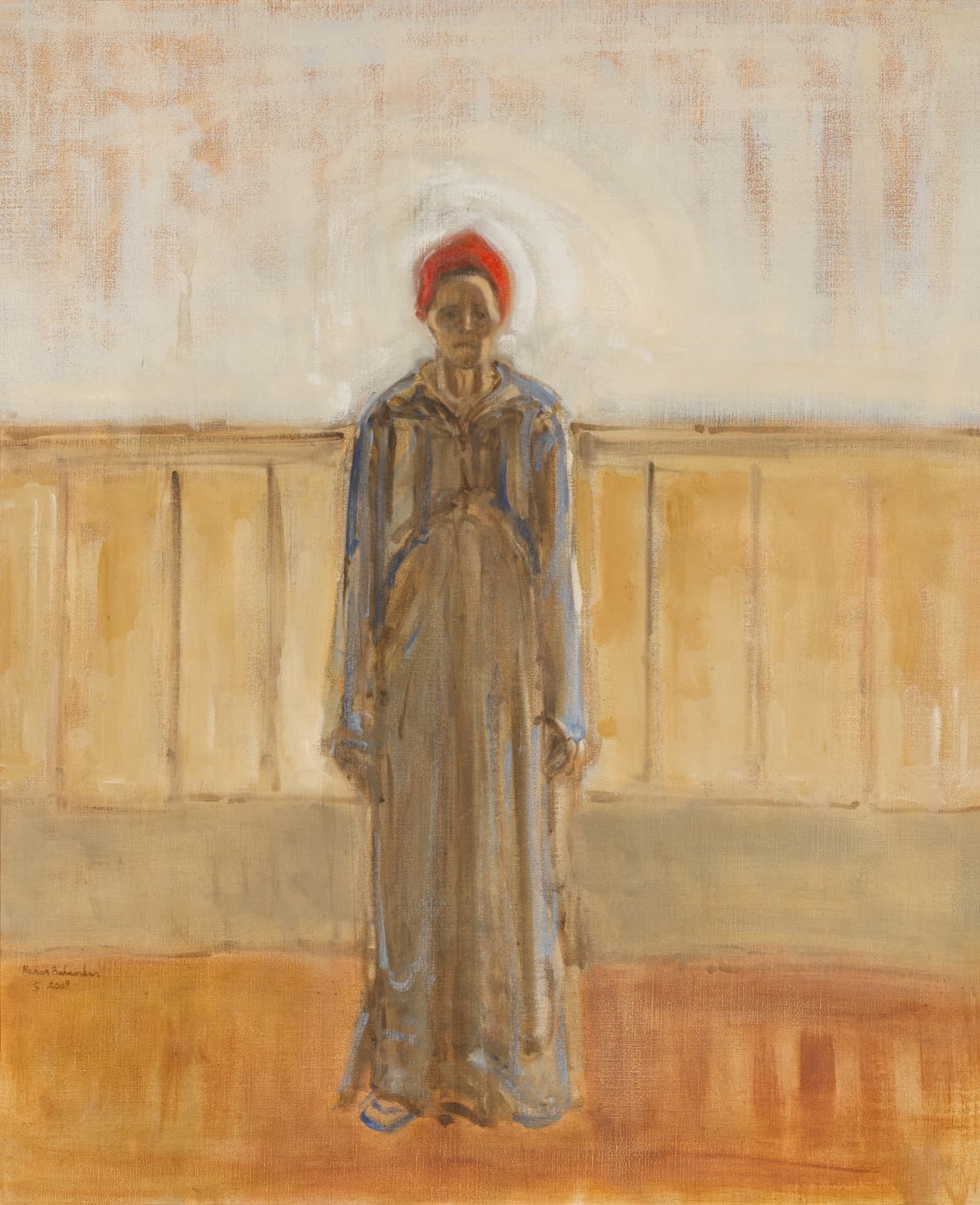 Standing figure in a red cap