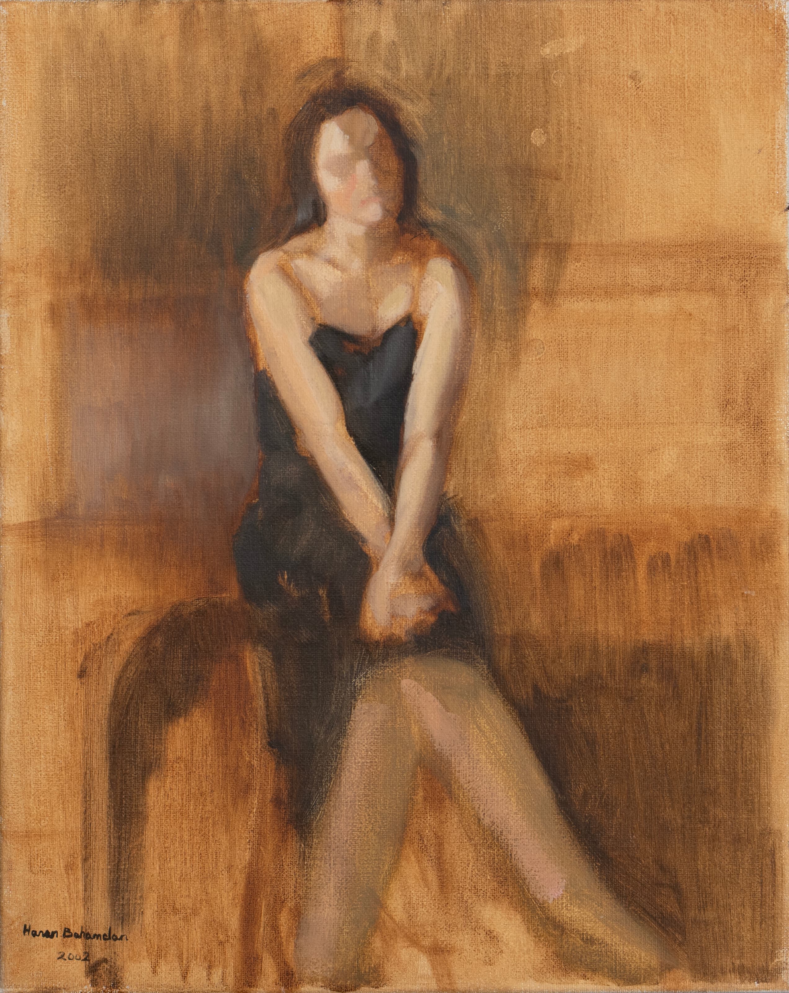 Seated woman in a black dress against an ochre background